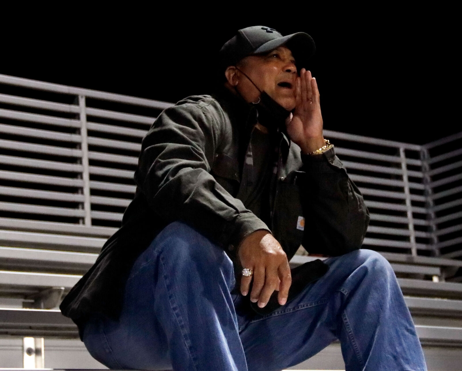 Fort Zumwalt North parent Marvin McGee cheers for his son Zach